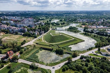 Aerial view of the historic star-shaped Gdańsk fortifications and green park in Poland.