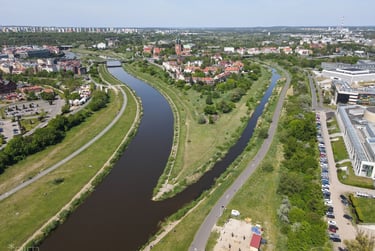 Aerial view of the Warta and Cybina river confluence in Poznan, Poland, featuring the historic Cathedral Island.