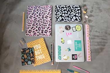Colorful study setup with laptop and stationery, symbolizing Admit 360's PTE test prep
