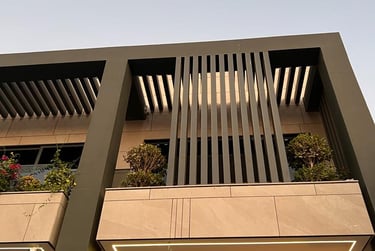 Vertical aluminum louver screen for villa window privacy and modern facade design.