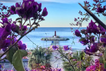 Villajoyosa lighthouse with bouganvilla flowers
