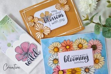 Three spring-related floral handmade greeting cards