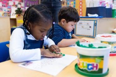 students work on oopa playdough mats
