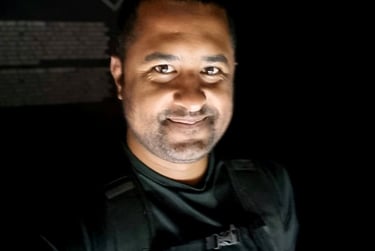 a Software Developer man in a black shirt and black shirt picture in your prifile