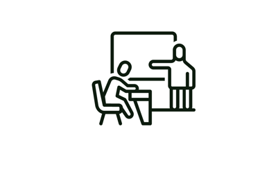 a man standing in front of a whiteboard with a man in a chair