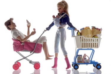 a doll with a shopping carton