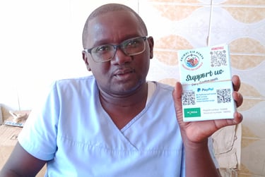 Dr. Vet Peter from Animal Aid Kenya with AAK flyers