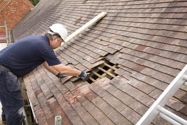 A roof leak in the process of being repaired