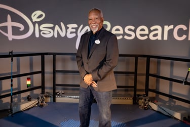 Disney Imagineer and researcher, stands in the Disney Research lab.