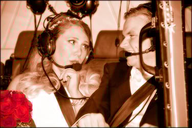 wedding couple inside a helicopter