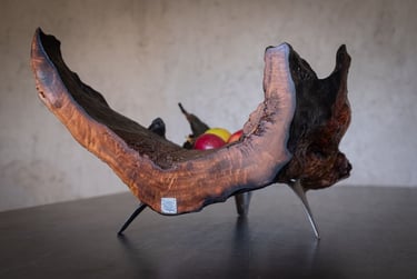 Turned wood fruit bowl with metal legs by Jan Vingerhoets