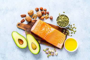a salmon steak with avocado, nuts, nuts, and nuts