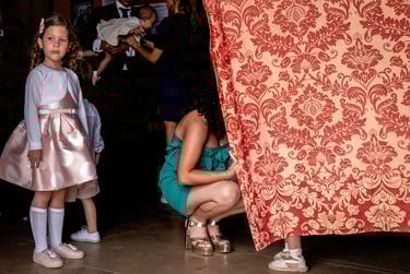a woman in a dress and a little girl in a dress