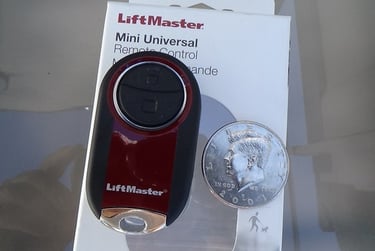 Mini remote control for garage door opener.