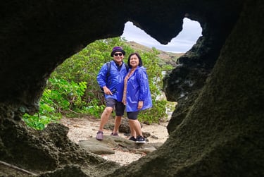 Man and Woman in Biri Island Rock Formation