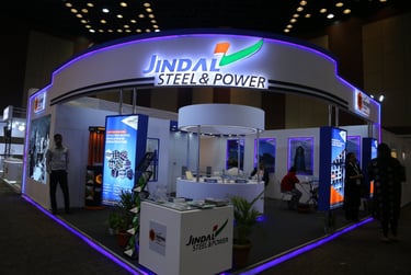 a man standing in front of a steel steel steel steel steel steel steel steel steel