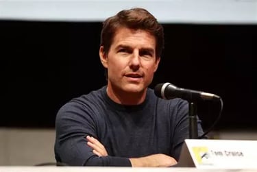 Photo de Tom Cruise las bras croisés