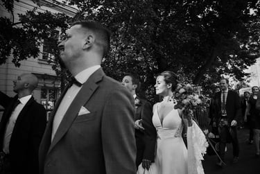 Newlywed couple walking towards the reception venue.