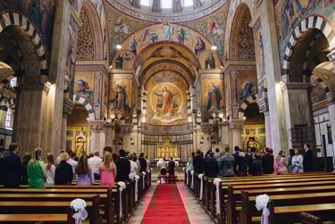 Wedding ceremony in Herz Jesu church in Berlin.