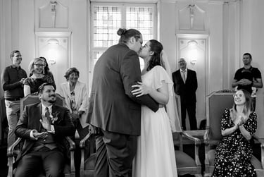 First kiss of bride and groom at Tempelhof-Schöneberg civil registry in Berlin.