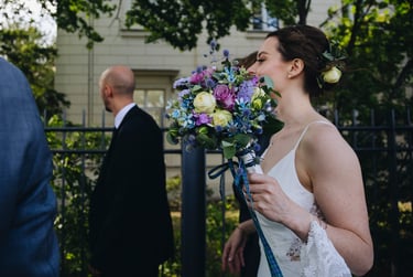Bridal bouquet held by the bride.