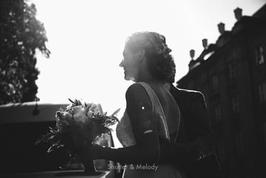Shoot of bride with flowers in a shadow.