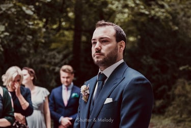 Groom crying at the altar.