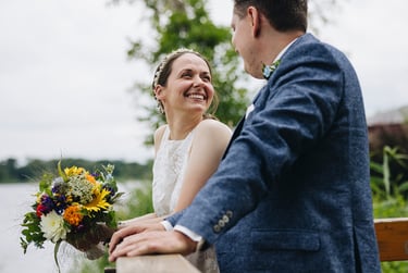 Newlyweds looking at each other.