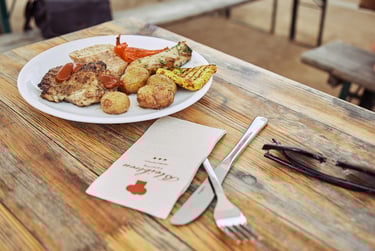 A plate of wedding food on a table.