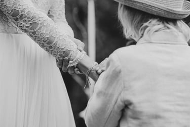 Bride showing a wedding armband.