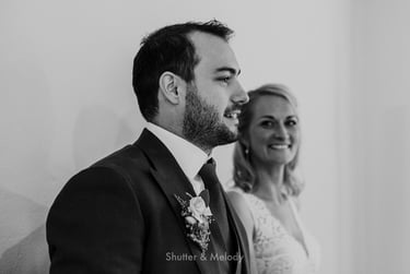 Grrom giving a speech at wedding reception.