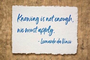 Inspirational Leonardo da Vinci quote on parchment paper: Knowing is not enough, we must apply.