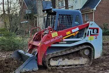 Skid Steer grading and land clearing by Storm Valley Landscape