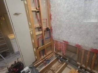 framing for shower and tub during a bathroom remodeling project
