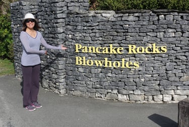 Janet at the Pancake Rocks Sign