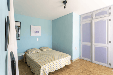 a bedroom with a bed and a bed in it