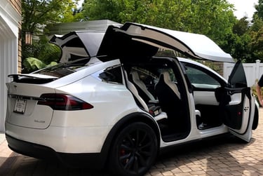 Completed Tesla Model X with 5% Ceramic Tint and all Falcon Wing Doors open,