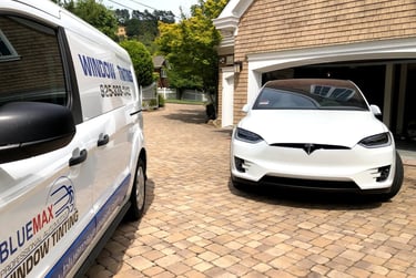 Tesla Model X with 5% Ceramic Tint and Bluemax Tint mobile service van in Livermore, CA.
