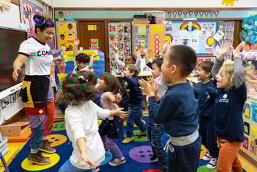 PreK class does a group movement together and has fun.