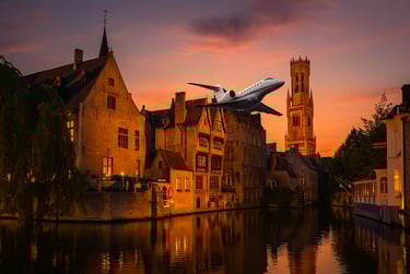 Jet privato sorvola su Bruges al tramonto.
