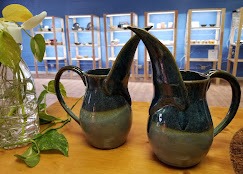Wheel thrown pottery pitchers made by John Bruce at Zebulon Pottery
