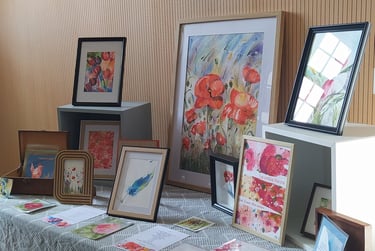 a table with a table cloth covered with pictures and pictures