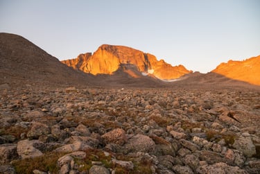 Majestic 14,259 foot Longs Peak glows at sunrise above the 12,600 foot boulderfields