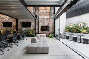 Interior Design of an Office integrating natural elements with furniture .