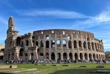 Tourists visiting the Colosseum in Rome, Italy