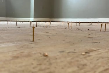 re-screwing subfloor.