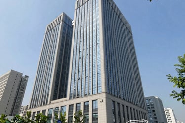 low angle photo of city high rise buildings during daytime