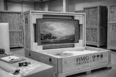 Painting in wooden crate