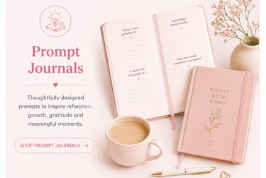 Pink guided prompt journal for gratitude and reflection with a coffee cup and flowers.