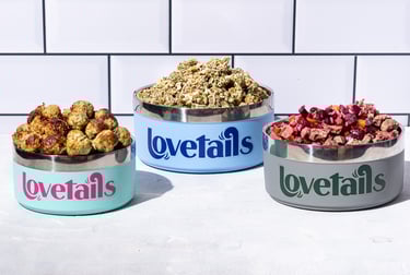 three bowls of pet food are shown in this picture